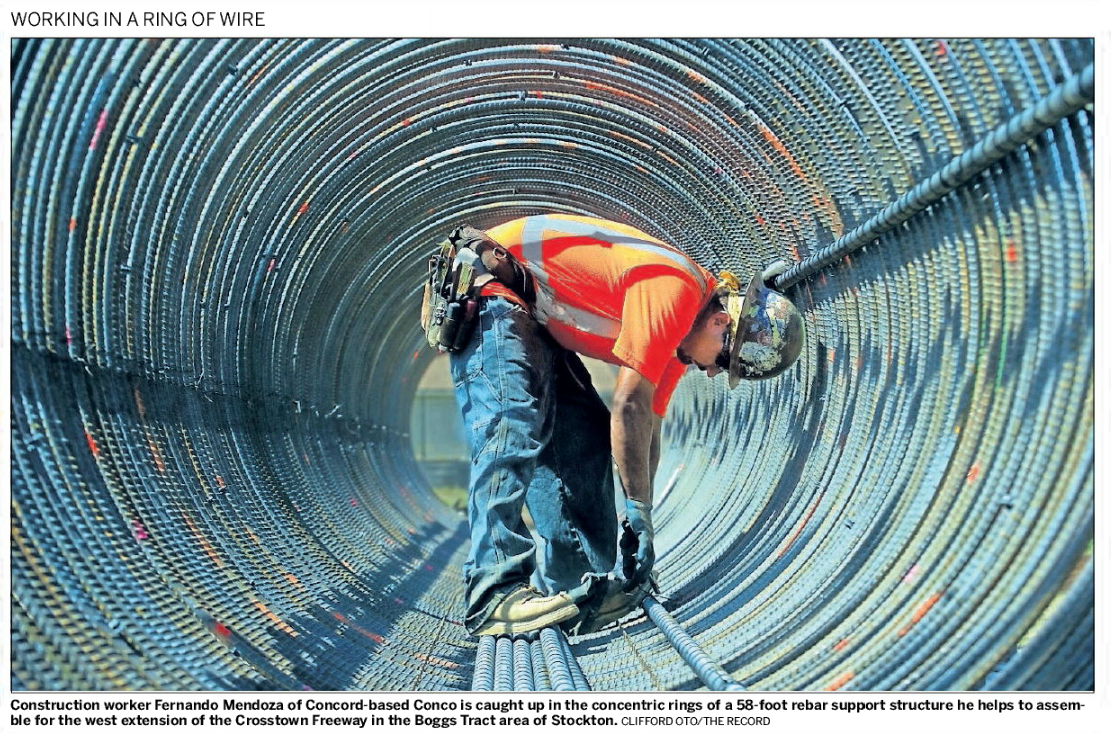 Const worker rebar support photo credit Clifford Oto-The Record