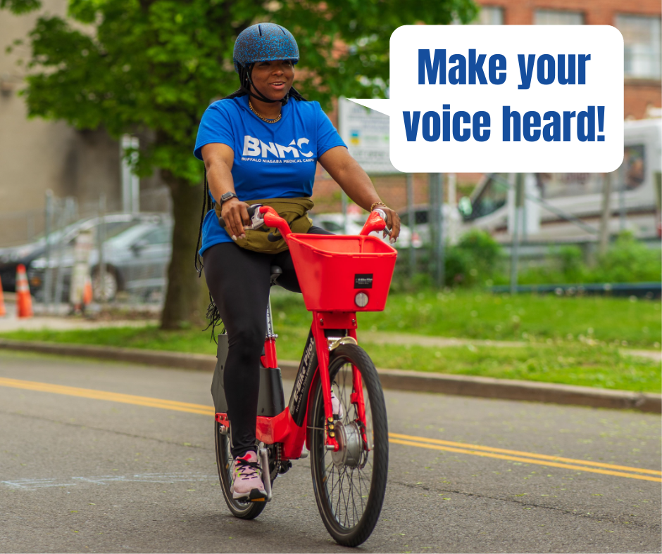 A woman on a bike with a speech bubble that reads 