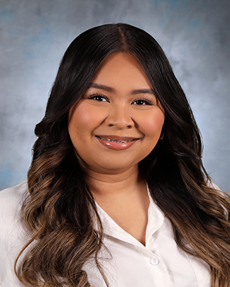 Headshot of Janicia Thedmada.